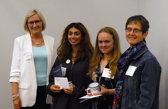 Christel Schmidt  and Dr. Petra Blix with two female UIC students
