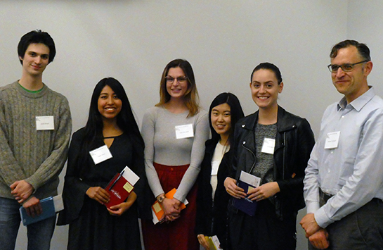 Mixed group of UIC students with their book prizes and Prof. Patrick Fortmann