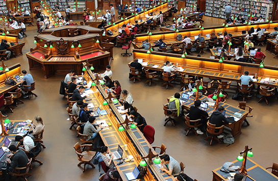 Students studying at the State Library of Victoria, Melbourne, Australia